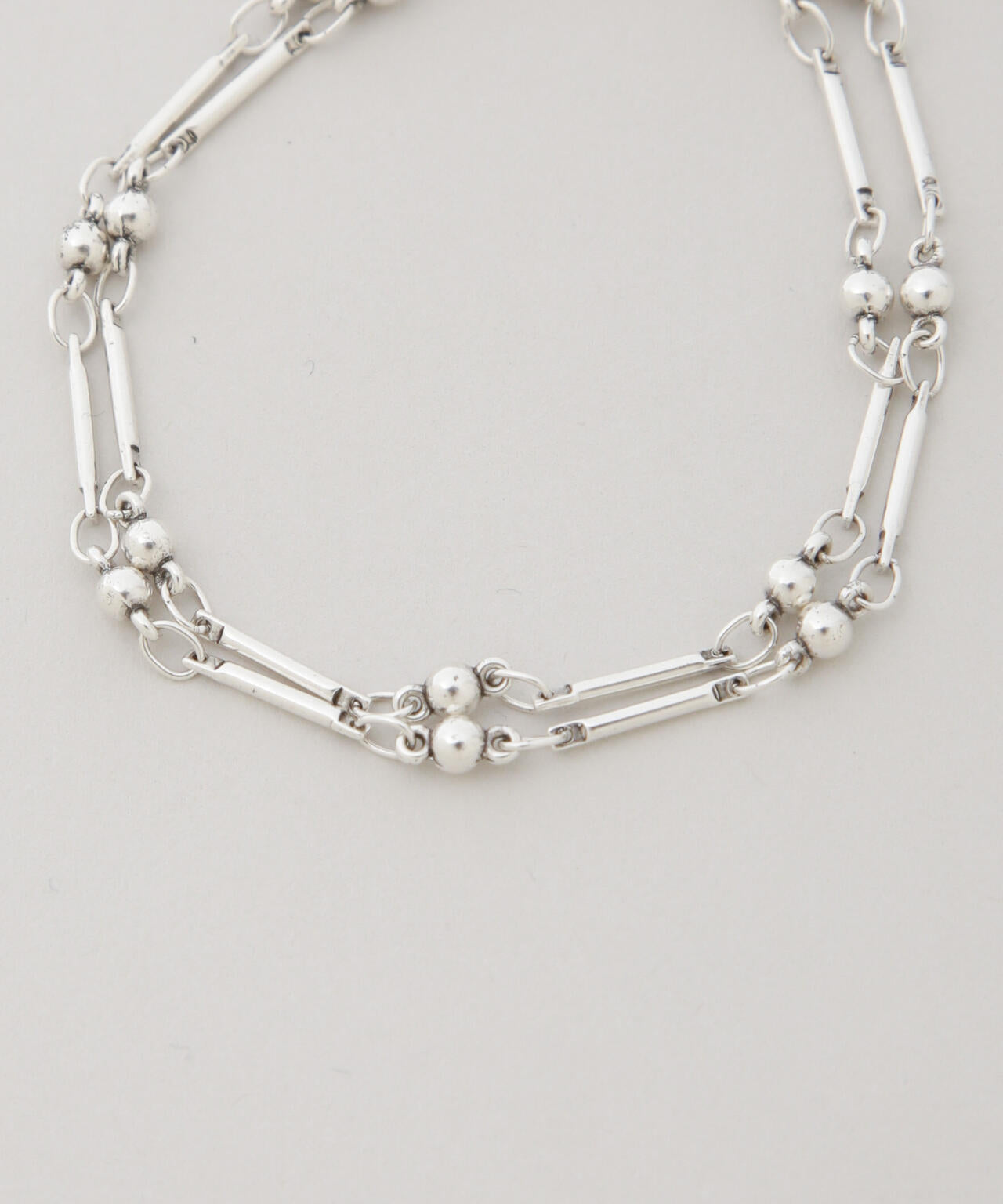 PHILIPPE AUDIBERT/Garnet double bracelet 6715248075