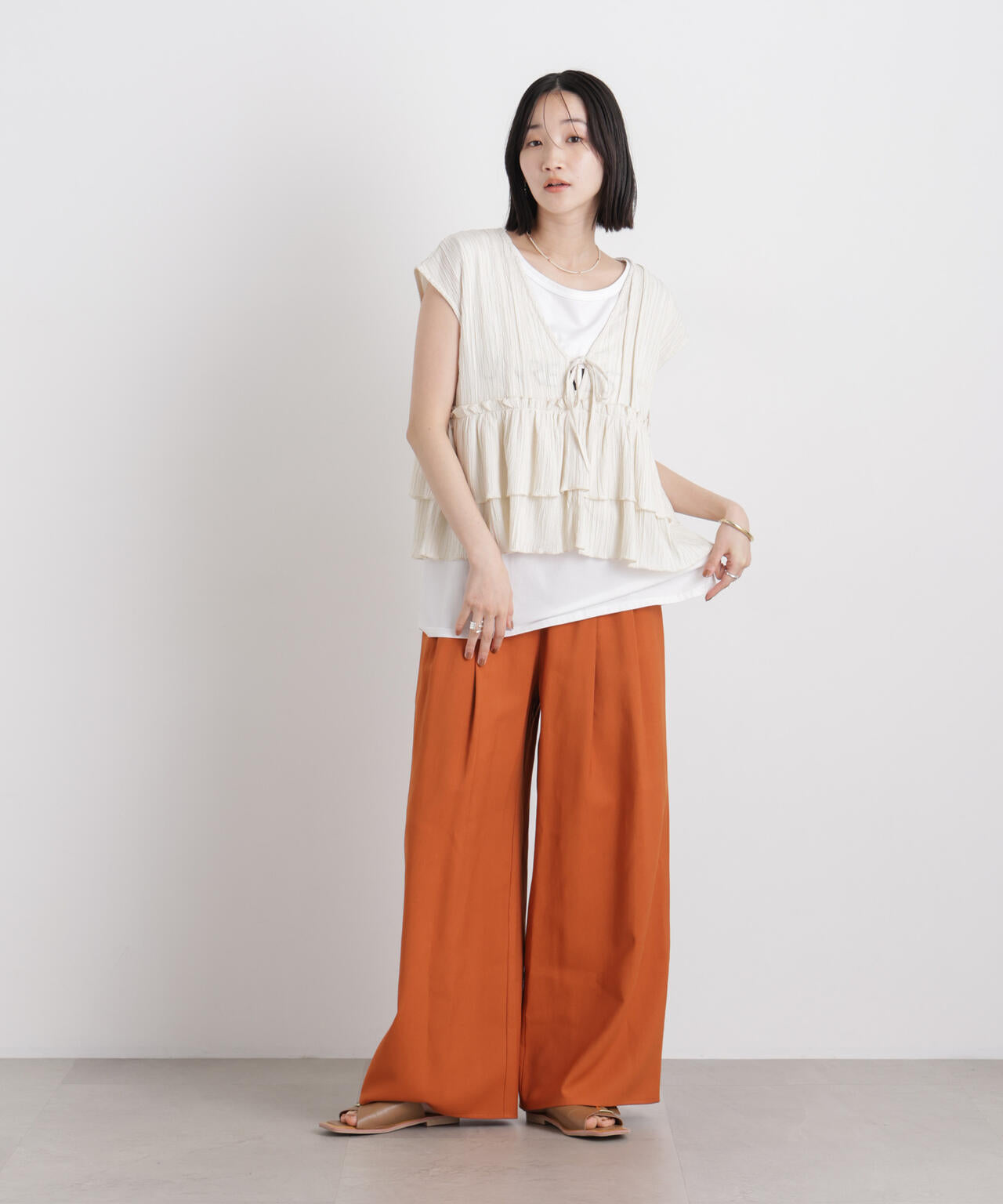 シャーリング楊柳ティアードフリルブラウス 6736121313