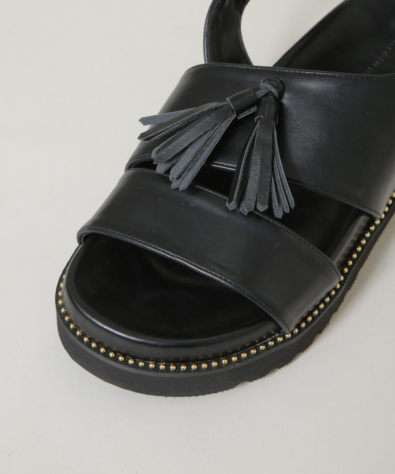 プラットフォームタッセルサンダル 6696133303