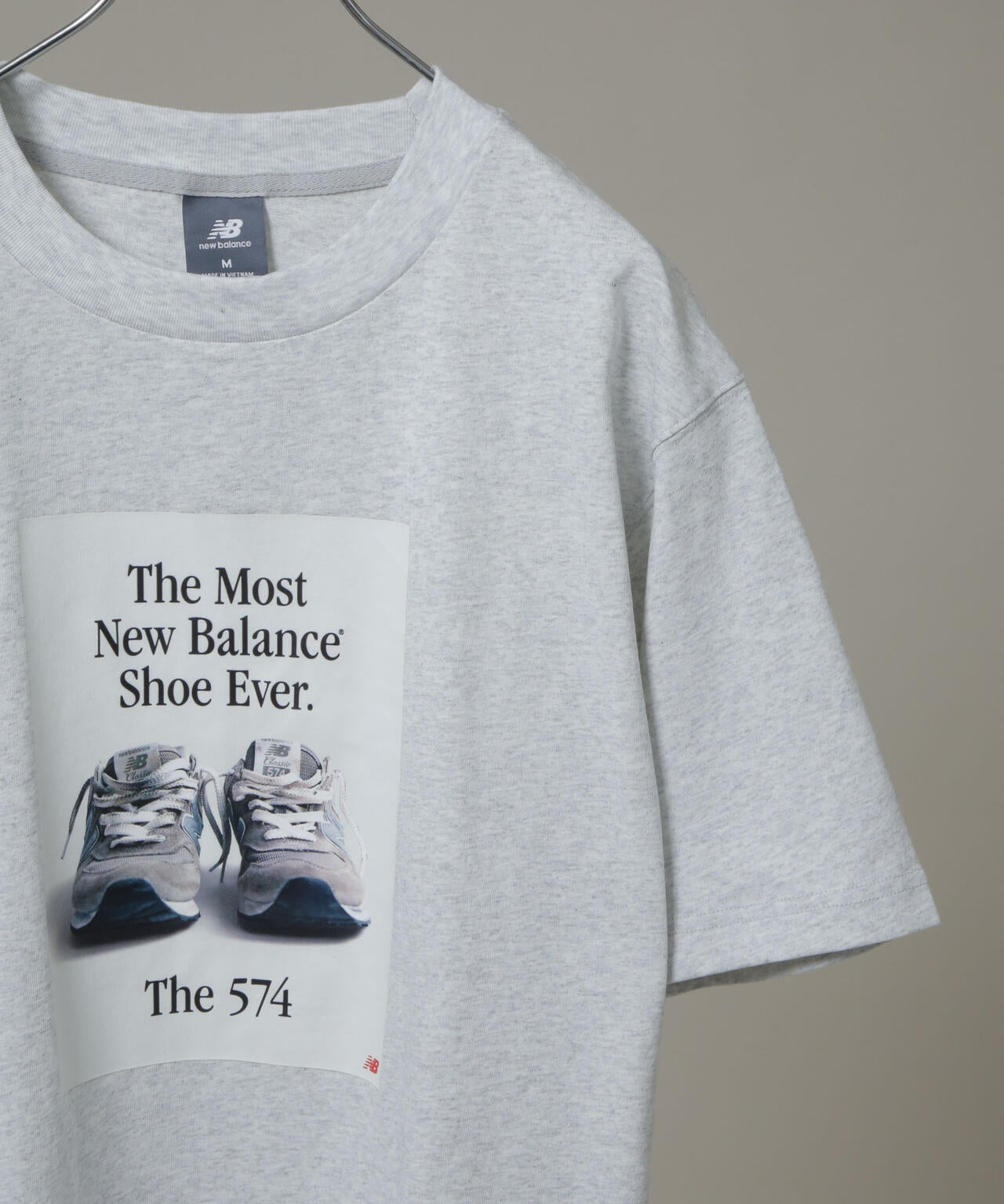 new balance/574広告Tシャツ 6706124012
