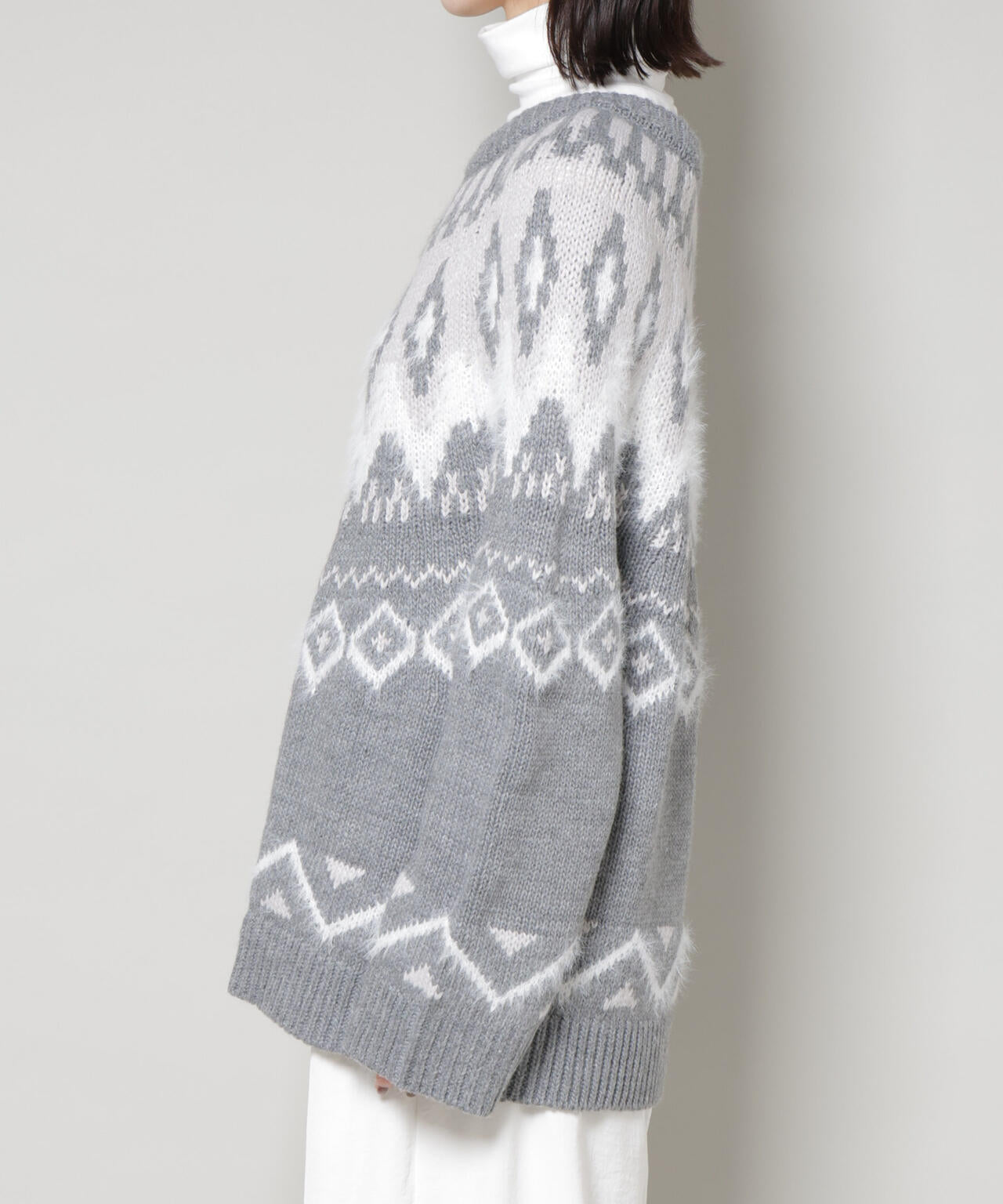 シャギーミックス求心柄ニットトップス 6735222350