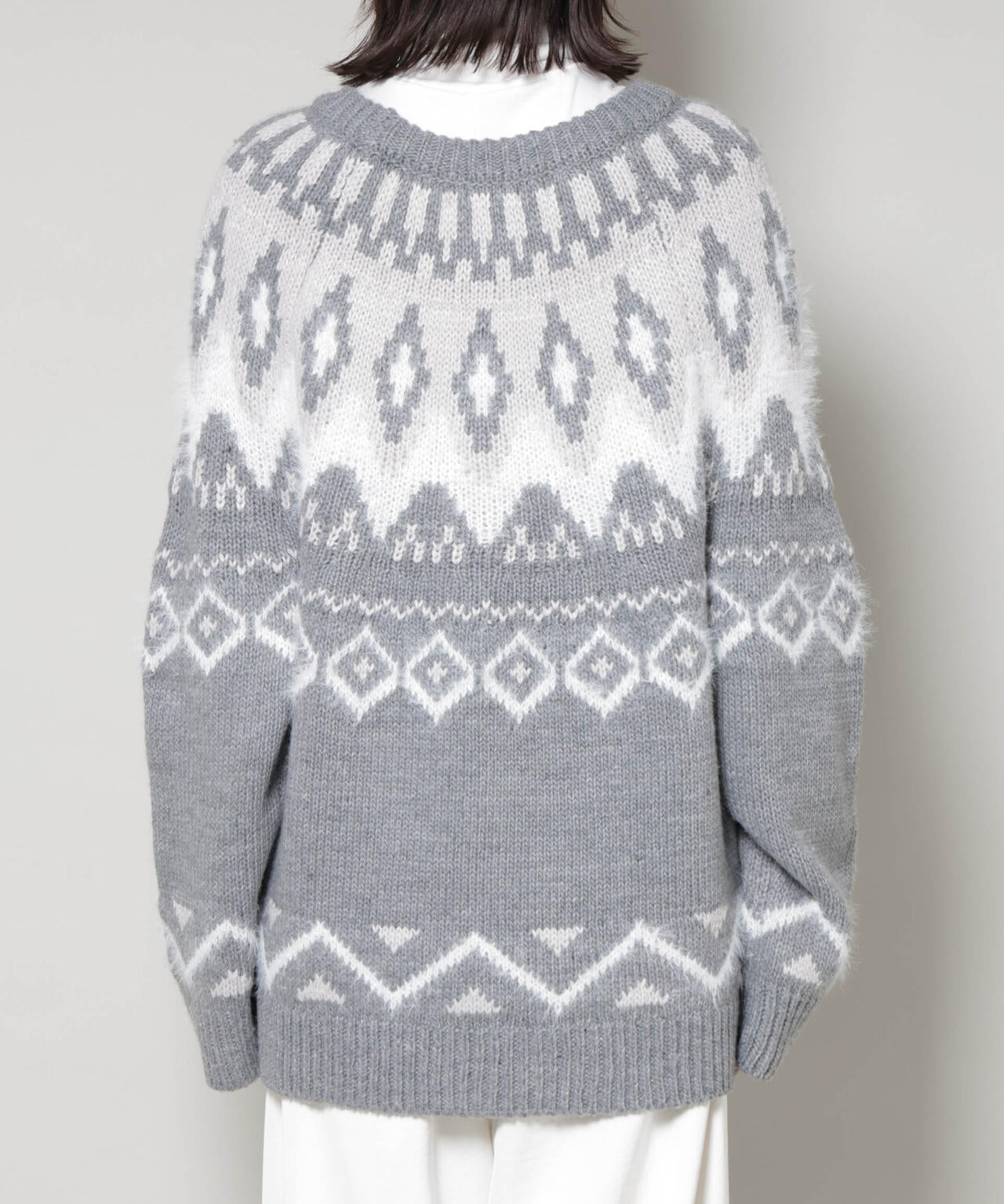 シャギーミックス求心柄ニットトップス 6735222350