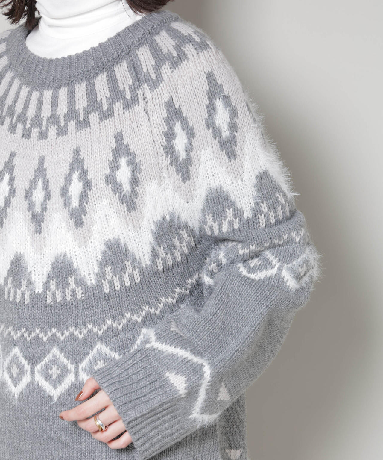 シャギーミックス求心柄ニットトップス 6735222350