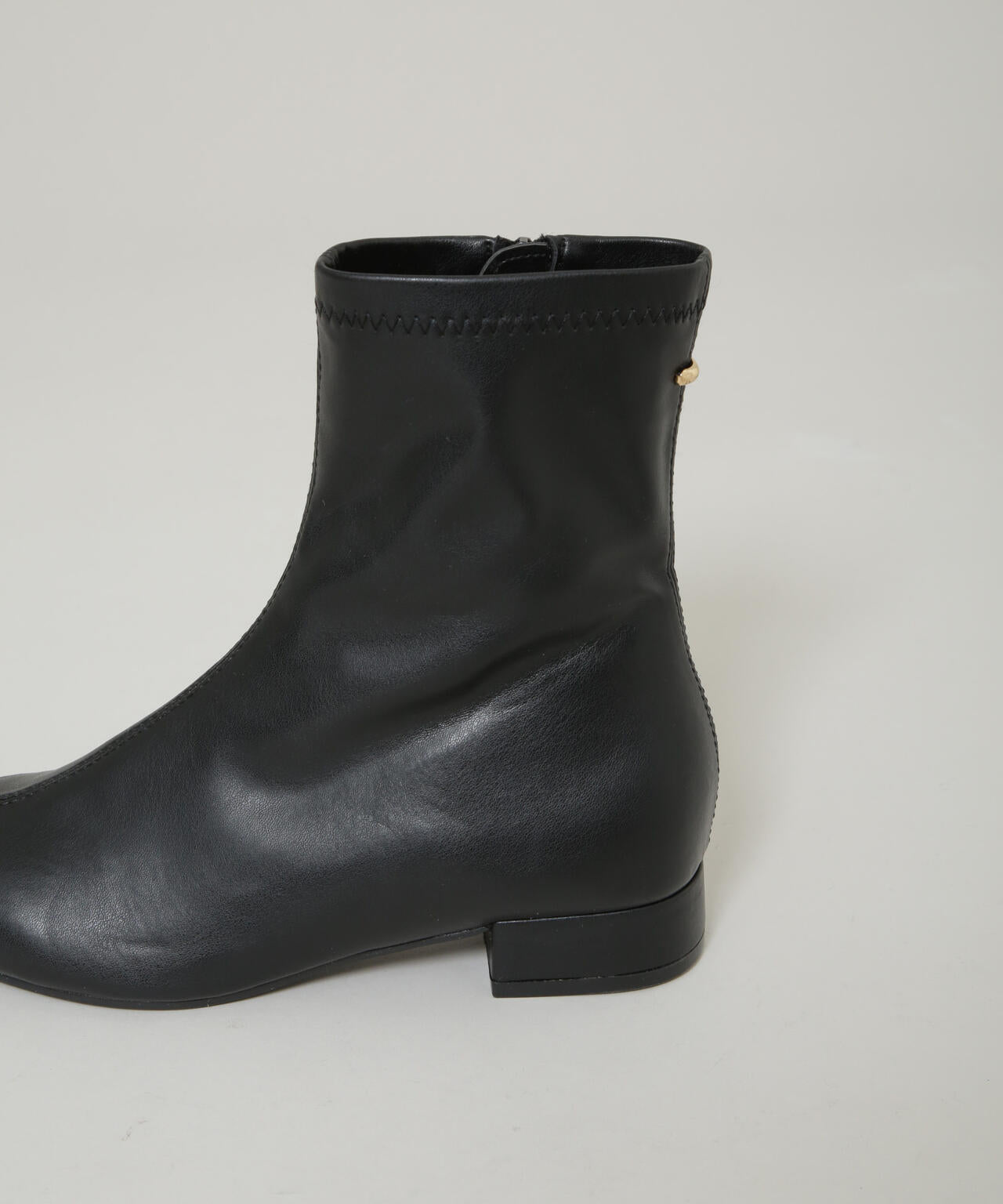 メタルモチーフ付きポインテッドトゥストレッチブーツ 6735236301